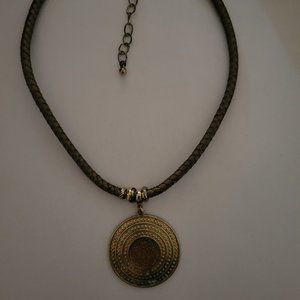 Brown braided necklace with gold-tone circle pendant